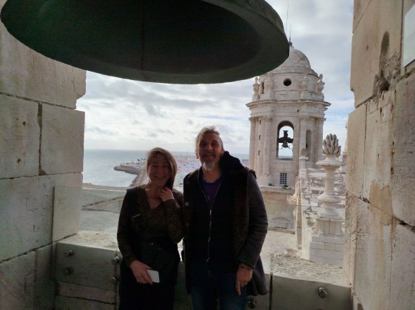 Couple in a bell tower of the Cadiz cathedral as part of Spanish immersion tour