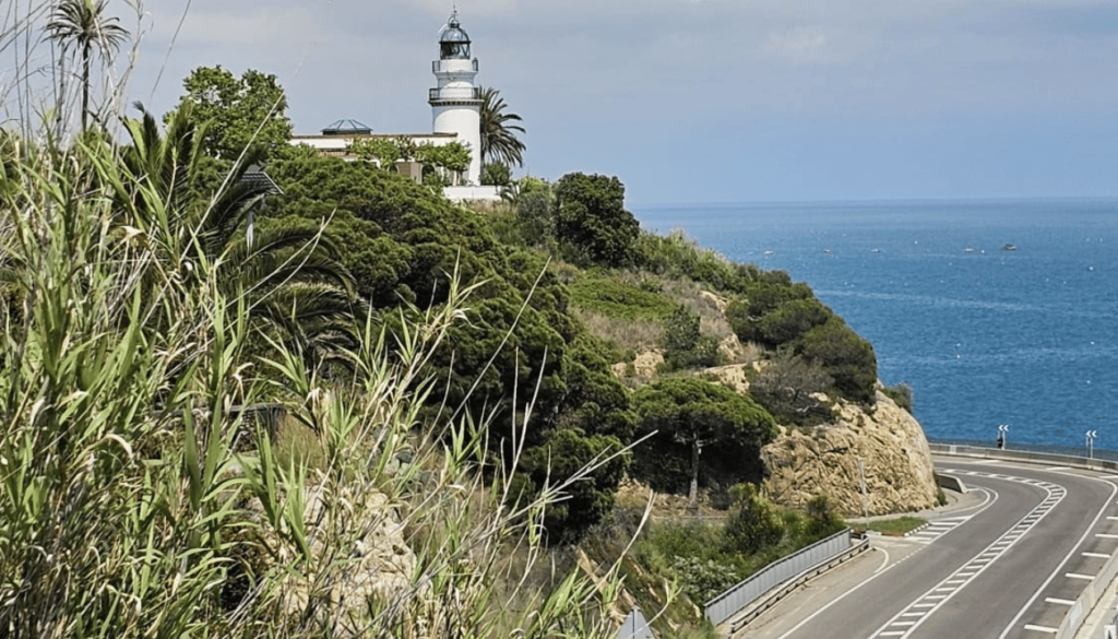 Monica at Calella – Lighthouse Views with the Sea Stretching Beyond
