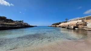 Cala Blanca Beach: Relax on Menorca’s Coast