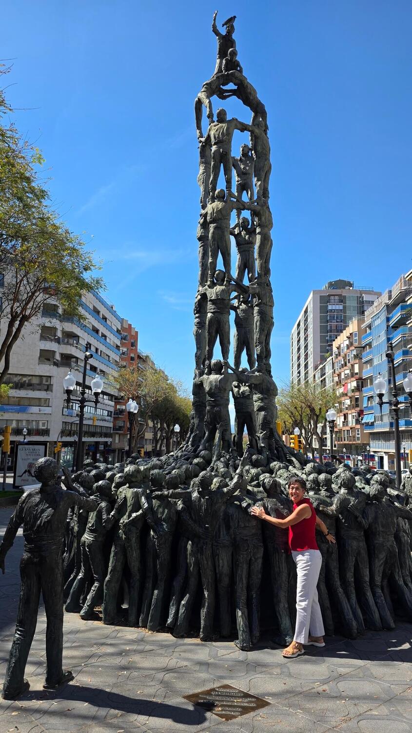 woman in front of sceupture in Tarragona